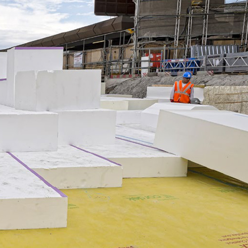 Large white EPS void former blocks installed in a ground floor foundation.