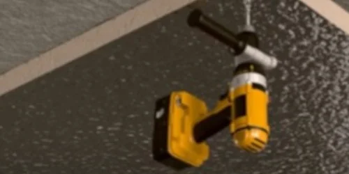 Worker installing or inspecting a dark ceiling panel