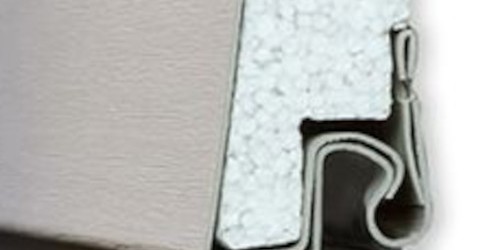 Profile view of white exterior siding with integrated grey insulation