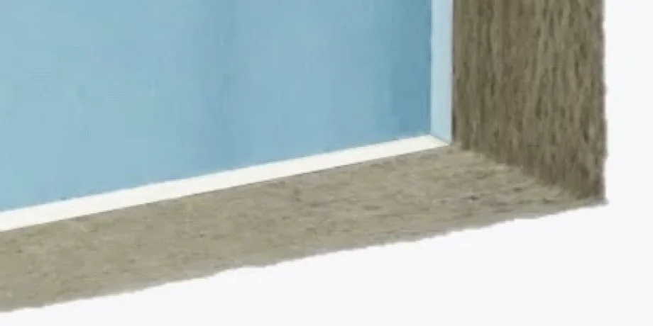 Detail view of a fire-rated plasterboard panel bonded to a layer of dense rockwool insulation
