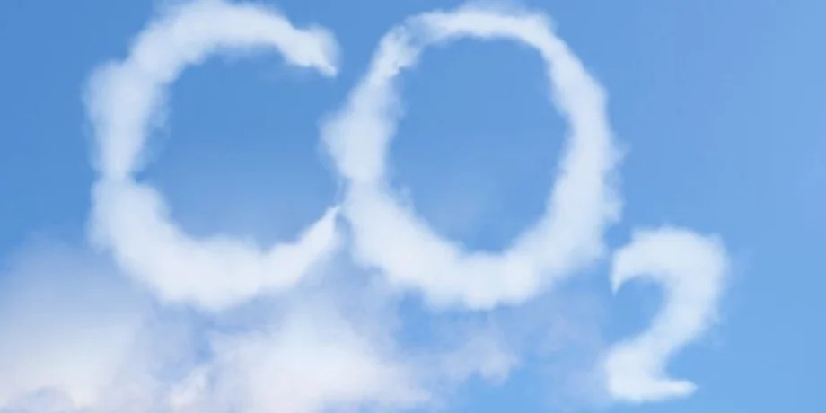 Clouds in a blue sky forming the text CO2