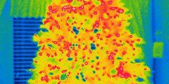 Thermal heat map image showing temperature variations on a building