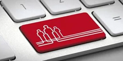 Computer keyboard featuring a red key with a family icon