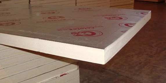 Rigid insulation boards stacked on a construction site