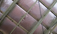 Insulation methods for a warm pitched roof